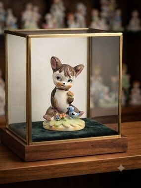 Vintage Lefton hand-painted ceramic bear figurine.